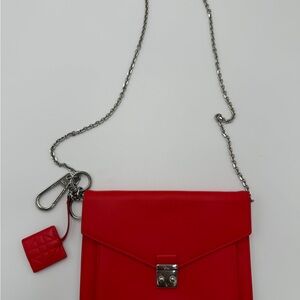 Dior vibrant red clutch with chain crossbody bag